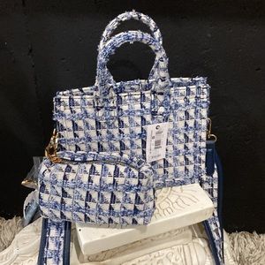 Small Crossbody Handbag with cosmetic accessory case, and 2 straps.